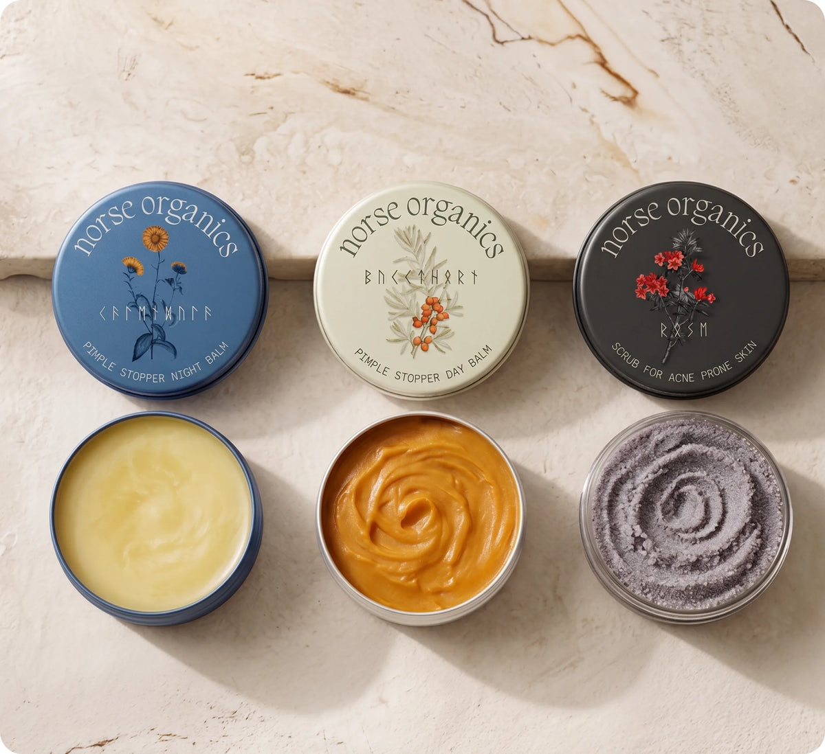 De tre Norse Organics-burkarna öppna och stängda på en marmoryта